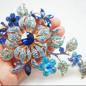 Elegant Blue and Gold Floral Brooch